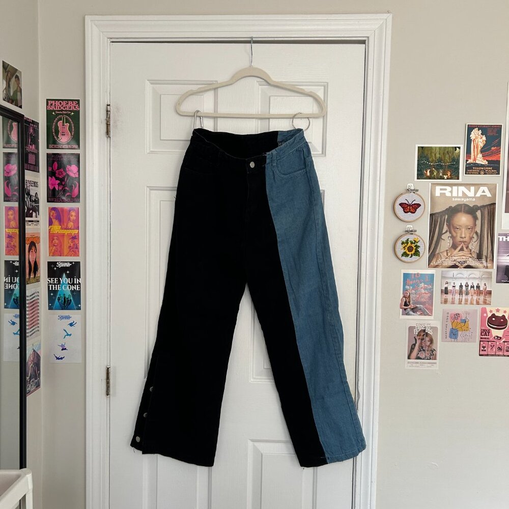 Black and blue split-leg jeans